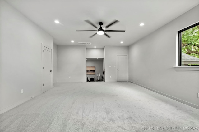 3008 S Boston Ct, Tulsa, OK 74114 - unfurnished living room with ceiling fan, recessed lighting, and carpet