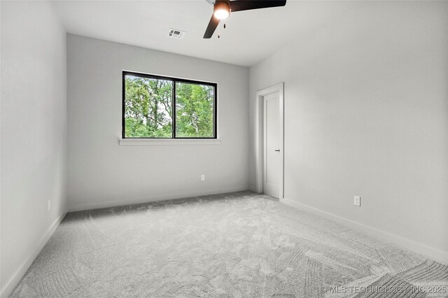 3008 S Boston Ct, Tulsa, OK 74114 - unfurnished bedroom featuring carpet and a ceiling fan