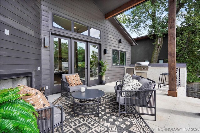 3008 S Boston Ct, Tulsa, OK 74114 - view of patio / terrace with an outdoor kitchen and an outdoor hangout area