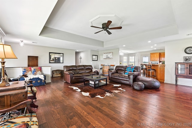 23535 E 720th Rd, Wagoner, OK 74467 - living area featuring a tray ceiling, ceiling fan, dark wood finished floors, and recessed lighting