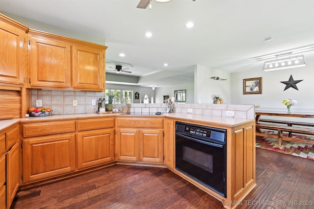 23535 E 720th Rd, Wagoner, OK 74467 - kitchen with ceiling fan, black appliances, dark wood-style flooring, light countertops, and recessed lighting
