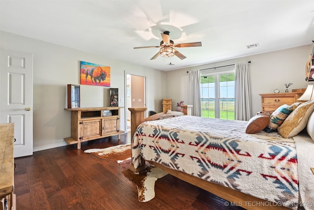 23535 E 720th Rd, Wagoner, OK 74467 - bedroom featuring dark wood-style floors and ceiling fan