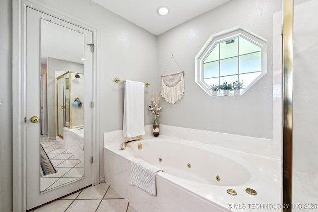 23535 E 720th Rd, Wagoner, OK 74467 - full bath featuring a stall shower, a jetted tub, and tile patterned flooring