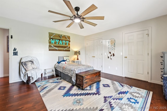 23535 E 720th Rd, Wagoner, OK 74467 - bedroom with wood-type flooring, ceiling fan, and a closet