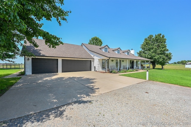 23535 E 720th Rd, Wagoner, OK 74467 - view of front of home with driveway, a porch, a garage, and a shingled roof