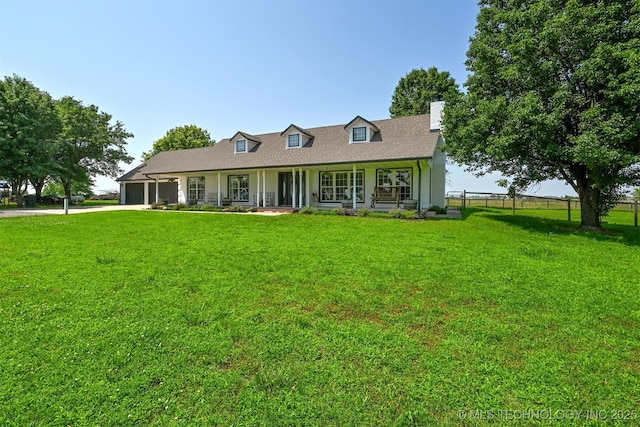 23535 E 720th Rd, Wagoner, OK 74467 - view of front of home with a porch, an attached garage, a chimney, and driveway