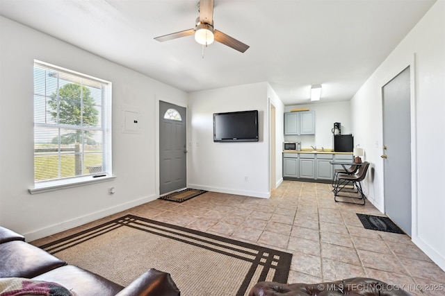 23535 E 720th Rd, Wagoner, OK 74467 - living room with a ceiling fan and baseboards