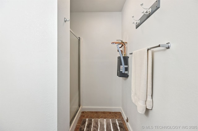 23535 E 720th Rd, Wagoner, OK 74467 - full bathroom with a shower stall and baseboards