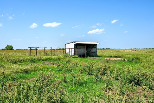 23535 E 720th Rd, Wagoner, OK 74467 - view of yard featuring a pole building, a rural view, and an outbuilding