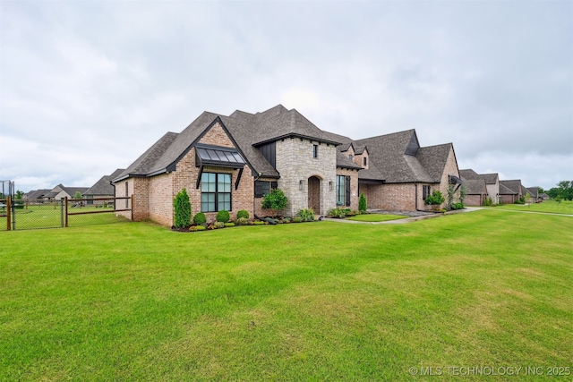 11325 S 212th E Ave, Broken Arrow, OK 74014 - french country home featuring stone siding, a shingled roof, and brick siding