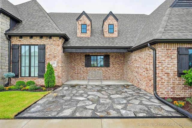 11325 S 212th E Ave, Broken Arrow, OK 74014 - property entrance with brick siding and roof with shingles