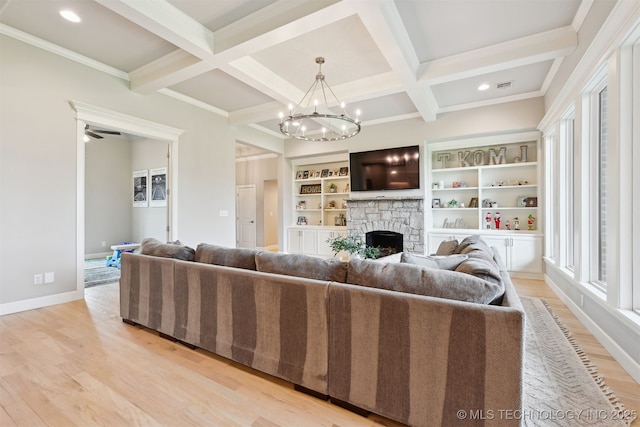 11325 S 212th E Ave, Broken Arrow, OK 74014 - living room featuring light wood finished floors, a fireplace, beam ceiling, coffered ceiling, and crown molding