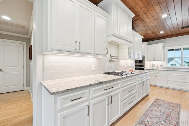 11325 S 212th E Ave, Broken Arrow, OK 74014 - kitchen featuring recessed lighting, light wood-style floors, white cabinetry, crown molding, and light stone countertops