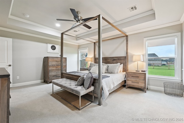 11325 S 212th E Ave, Broken Arrow, OK 74014 - bedroom with a tray ceiling, light carpet, ornamental molding, and a ceiling fan