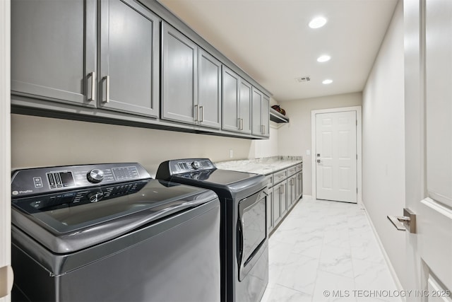 11325 S 212th E Ave, Broken Arrow, OK 74014 - laundry area featuring cabinet space, washing machine and clothes dryer, light marble finish flooring, and recessed lighting
