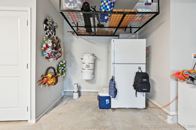 11325 S 212th E Ave, Broken Arrow, OK 74014 - garage featuring freestanding refrigerator and baseboards