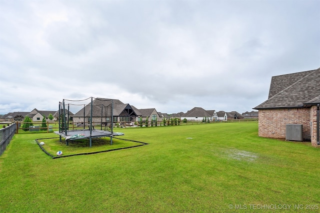 11325 S 212th E Ave, Broken Arrow, OK 74014 - view of yard featuring a trampoline and a residential view