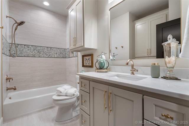 6026 E 119th Pl, Tulsa, OK 74137 - bathroom featuring vanity, shower / bathtub combination, and recessed lighting