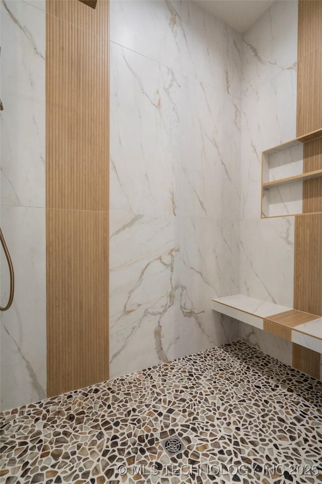 6026 E 119th Pl, Tulsa, OK 74137 - full bathroom featuring a marble finish shower and tile walls
