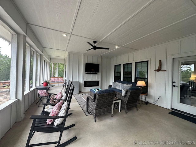 13425 SW 1025th Ave, Tuskahoma, OK 74571 - sunroom / solarium with a ceiling fan, plenty of natural light, a decorative wall, and recessed lighting