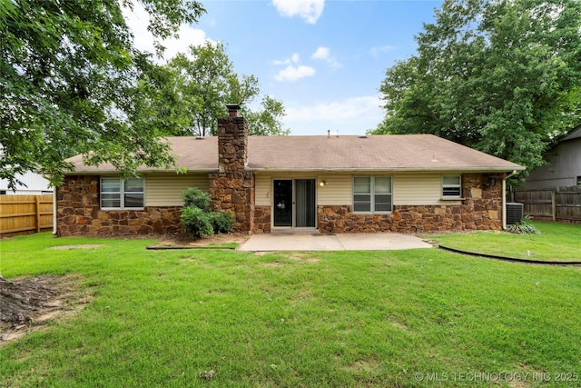911 N Fir St, Jenks, OK 74037 - back of property with stone siding, a patio, a chimney, and roof with shingles