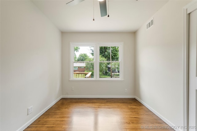 4015 S Urbana Ave, Tulsa, OK 74135 - unfurnished room featuring wood finished floors and a ceiling fan