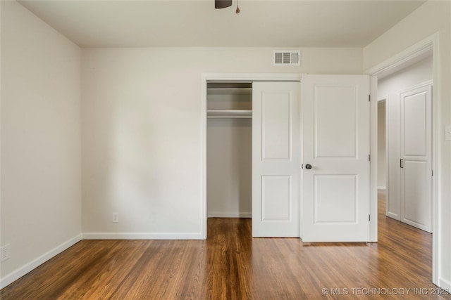 4015 S Urbana Ave, Tulsa, OK 74135 - unfurnished bedroom with wood finished floors and a closet
