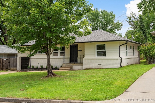 4015 S Urbana Ave, Tulsa, OK 74135 - view of front facade featuring brick siding, an attached garage, roof with shingles, concrete driveway, and crawl space