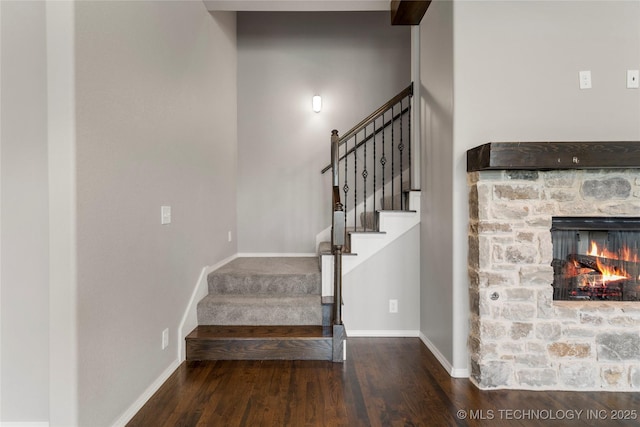 12913 S Ash St, Jenks, OK 74037 - staircase with wood finished floors and a fireplace