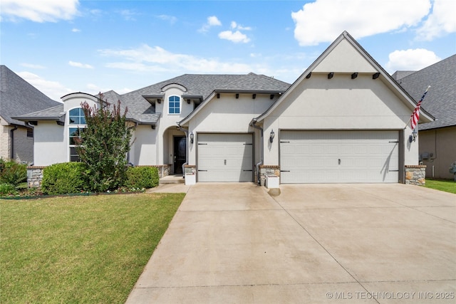 12913 S Ash St, Jenks, OK 74037 - french country home featuring stucco siding, an attached garage, a front lawn, concrete driveway, and a shingled roof