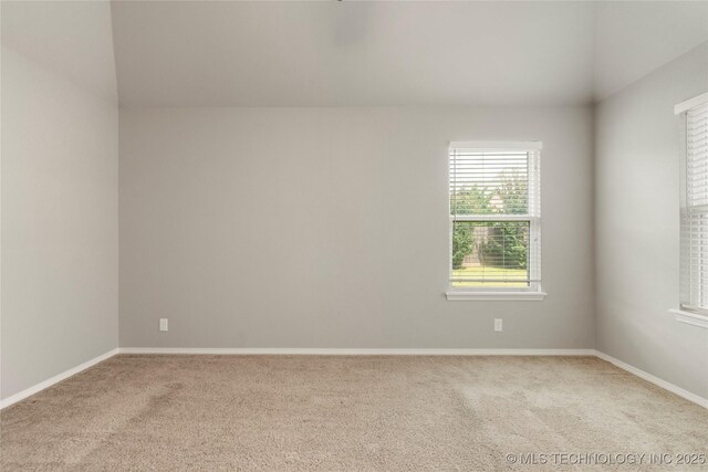 12913 S Ash St, Jenks, OK 74037 - spare room featuring carpet floors and lofted ceiling