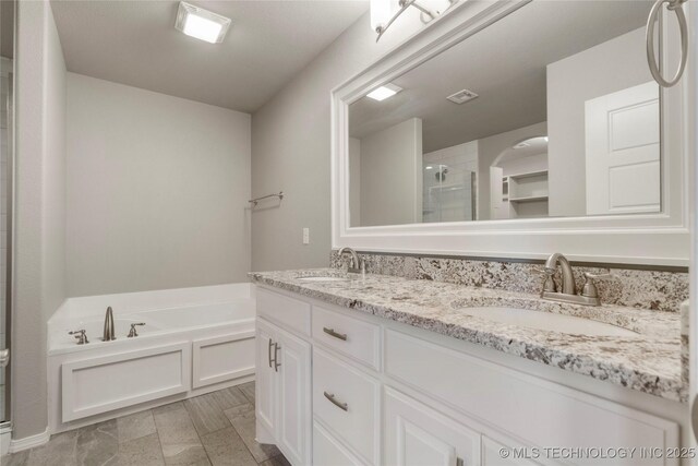 12913 S Ash St, Jenks, OK 74037 - bathroom with a stall shower, double vanity, and a bath