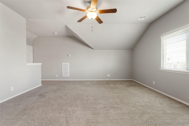 12913 S Ash St, Jenks, OK 74037 - additional living space with lofted ceiling, carpet, and a ceiling fan