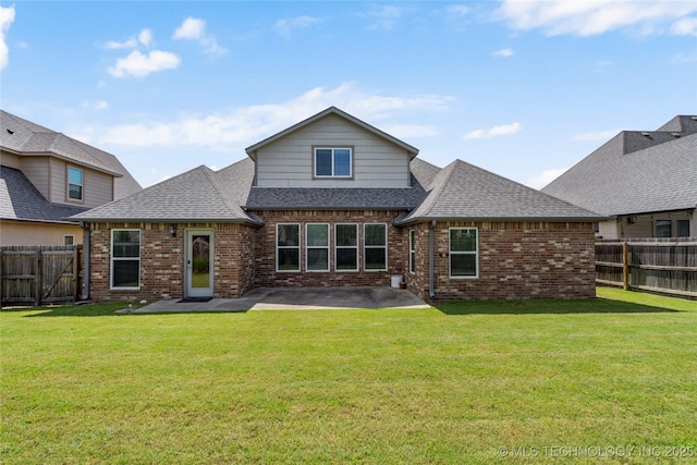 12913 S Ash St, Jenks, OK 74037 - rear view of house featuring brick siding, a patio, a shingled roof, and a fenced backyard