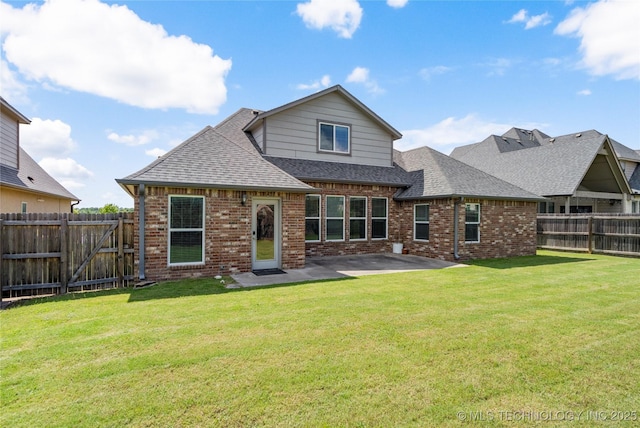 12913 S Ash St, Jenks, OK 74037 - back of property with a shingled roof, brick siding, a patio, and a fenced backyard