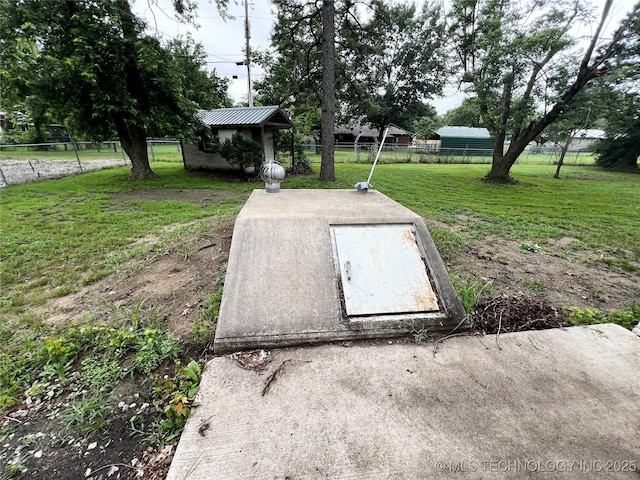 619 W 4th St, Skiatook, OK 74070 - entry to storm shelter