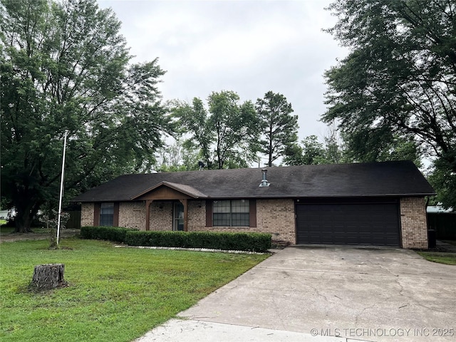 619 W 4th St, Skiatook, OK 74070 - single story home featuring brick siding, an attached garage, a front yard, and concrete driveway