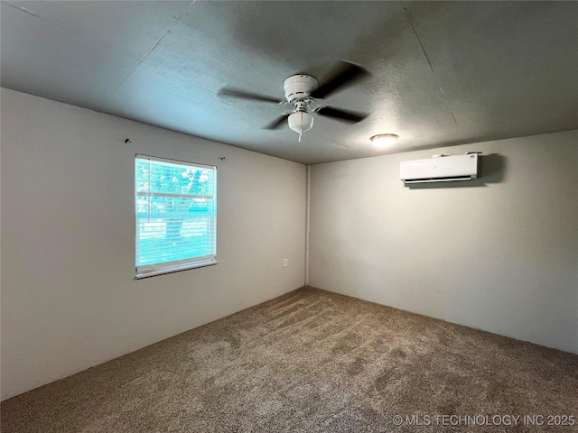 619 W 4th St, Skiatook, OK 74070 - spare room featuring a wall unit AC, carpet floors, and ceiling fan