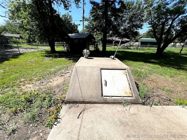 619 W 4th St, Skiatook, OK 74070 - entry to storm shelter