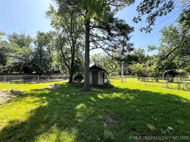 619 W 4th St, Skiatook, OK 74070 - fenced backyard with a storage shed