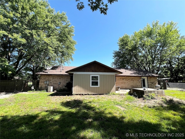619 W 4th St, Skiatook, OK 74070 - view of property exterior featuring brick siding