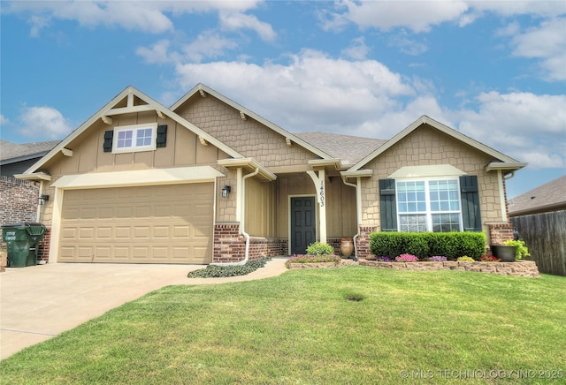 14603 E 114th St, Owasso, OK 74055 - view of front of house with board and batten siding, driveway, brick siding, and a front lawn