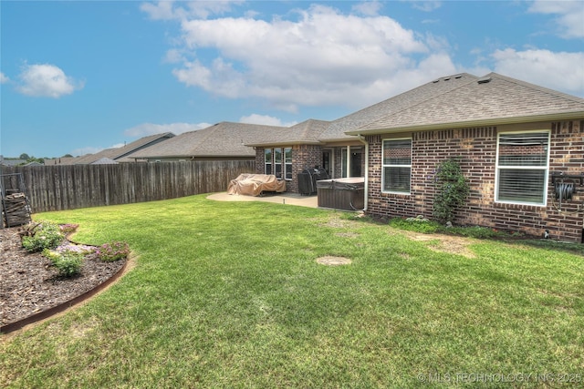 14603 E 114th St, Owasso, OK 74055 - fenced backyard with a hot tub and a patio area