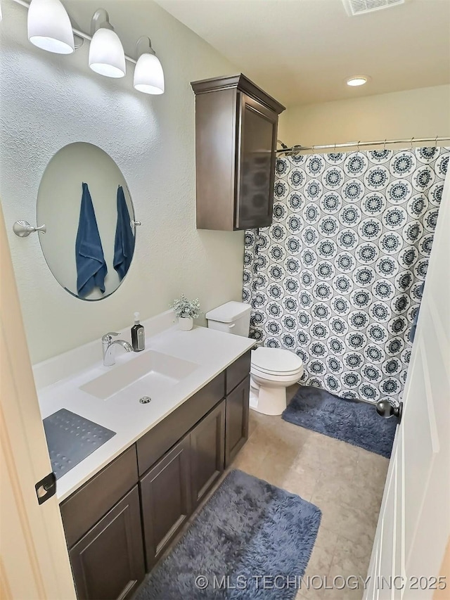14603 E 114th St, Owasso, OK 74055 - full bath featuring vanity and a shower with shower curtain