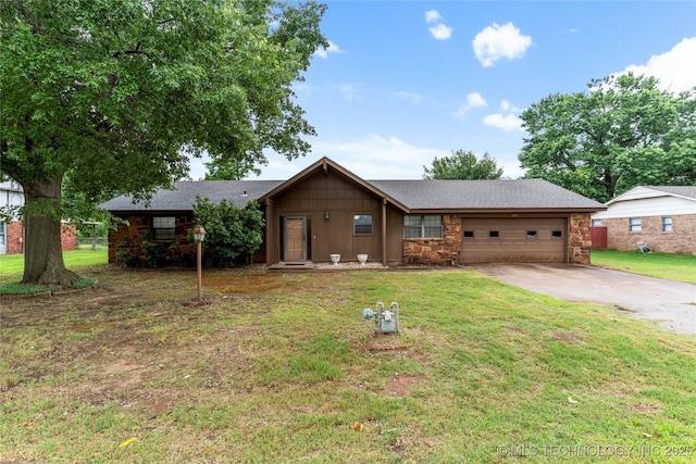 816 N Birch St, Jenks, OK 74037 - ranch-style house with concrete driveway, an attached garage, a front yard, stone siding, and roof with shingles
