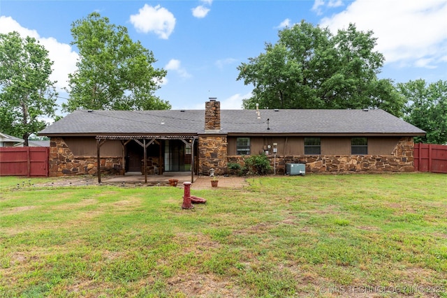 816 N Birch St, Jenks, OK 74037 - back of house featuring stone siding, a patio, and a chimney