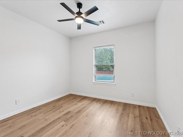 19345 S Fieldstone Dr E, Claremore, OK 74017 - empty room with wood finished floors and ceiling fan