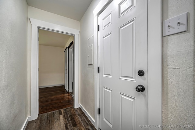 211 N 3rd St, Davis, OK 73030 - corridor featuring dark wood-style floors and a textured wall