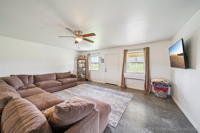5499 S 4240th Rd, Chelsea, OK 74016 - living area with finished concrete floors and ceiling fan