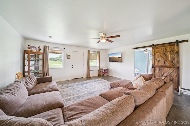5499 S 4240th Rd, Chelsea, OK 74016 - living area with a ceiling fan and a barn door